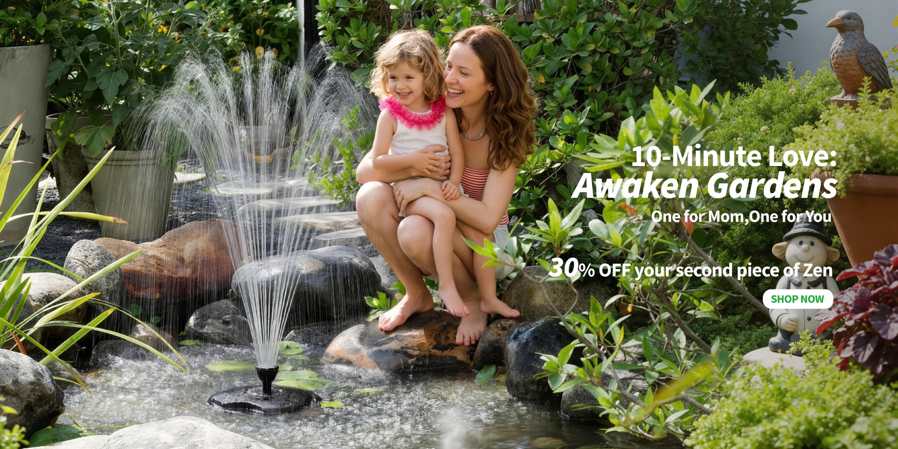 A mother and child enjoying a flowing garden water feature